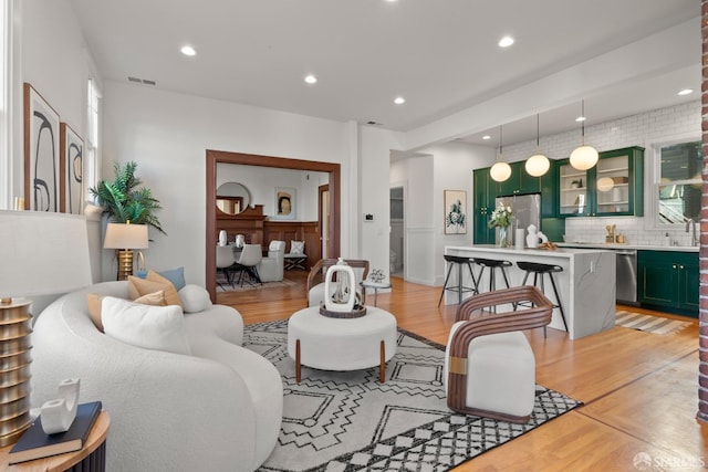 living room with light hardwood / wood-style floors