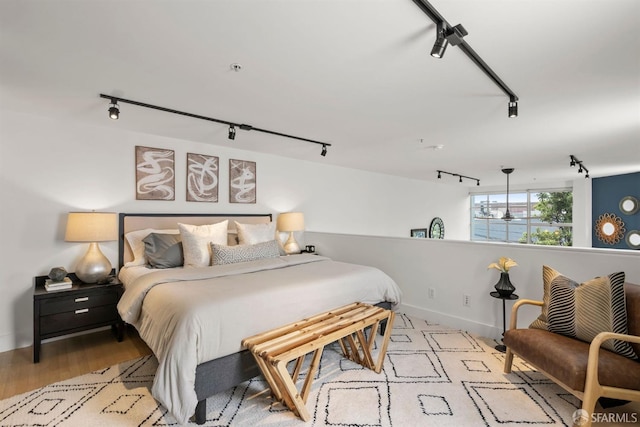1207 Indiana St Unit 10, San Francisco, CA 94107 - bedroom featuring wood finished floors, track lighting, and baseboards
