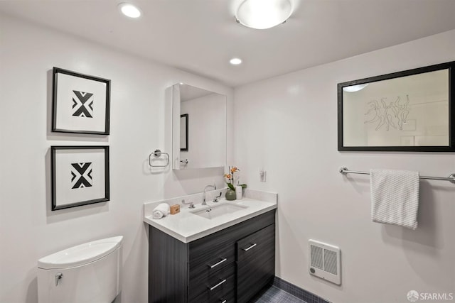1207 Indiana St Unit 10, San Francisco, CA 94107 - bathroom featuring toilet, vanity, heating unit, and recessed lighting