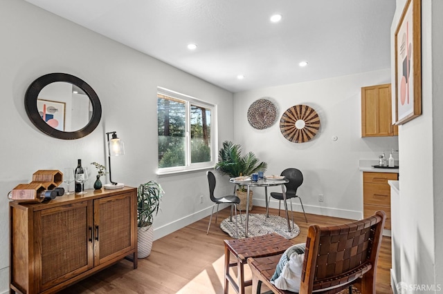 living area featuring light hardwood / wood-style flooring