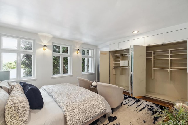 bedroom featuring wood finished floors