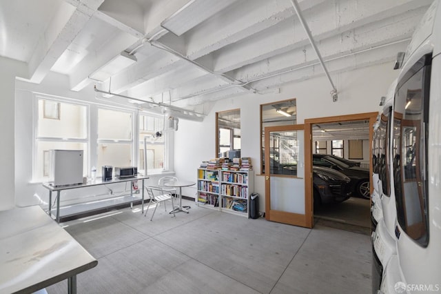 misc room with concrete flooring and plenty of natural light