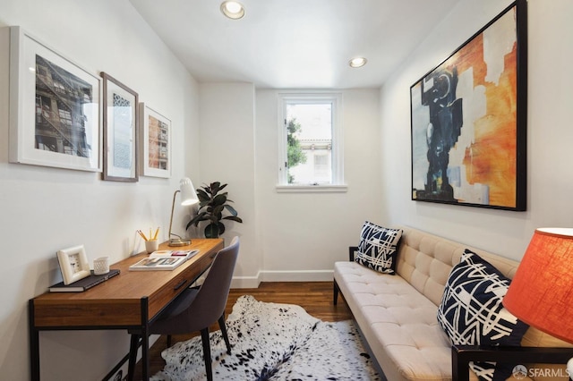 office space featuring baseboards, wood finished floors, and recessed lighting