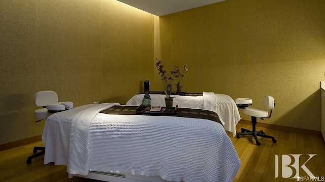 bedroom featuring wood-type flooring