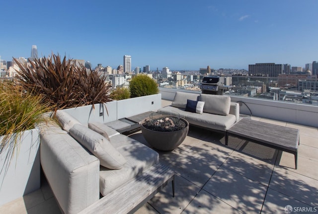 1545 Pine St Unit 1201, San Francisco, CA 94109 - view of patio / terrace featuring a view of skyline, an outdoor living space, and a grill