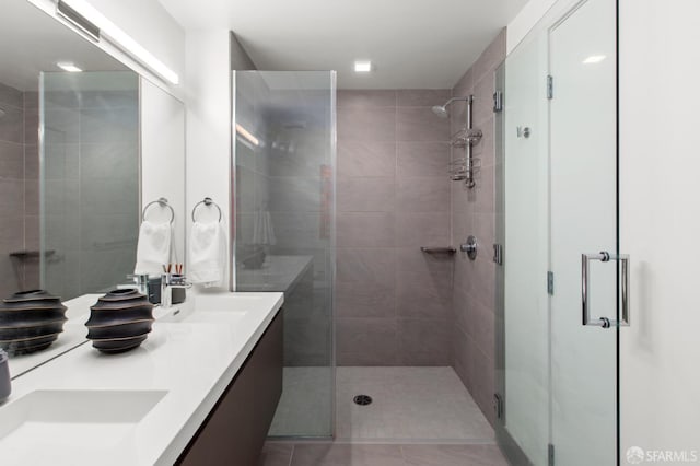 1545 Pine St Unit 1201, San Francisco, CA 94109 - full bathroom with a shower stall, double vanity, and tile patterned floors