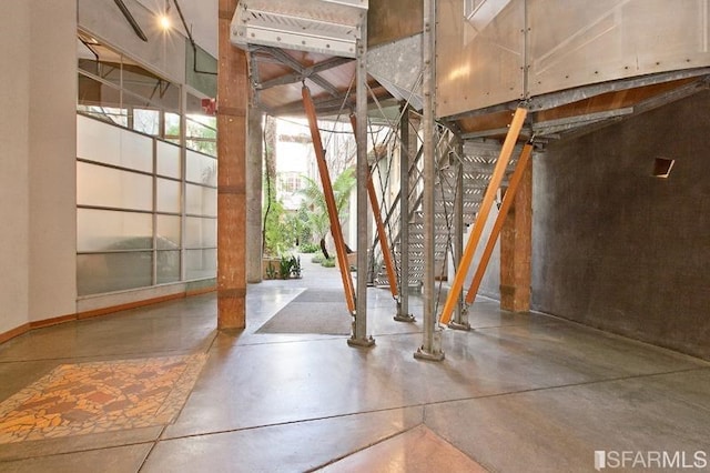 interior space featuring concrete floors