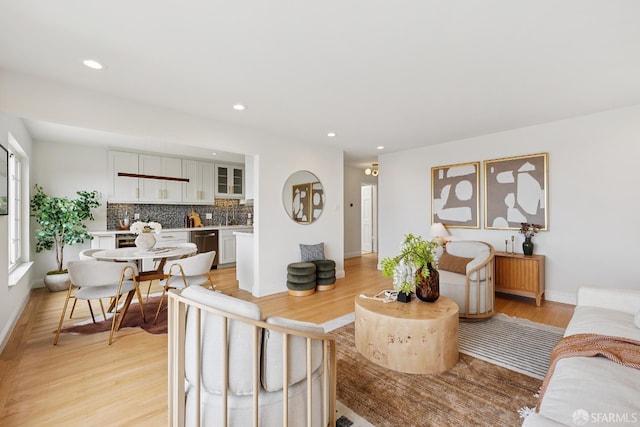 246 Ralston St, San Francisco, CA 94132 - living area with light wood-style floors and recessed lighting