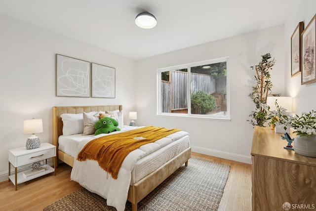 246 Ralston St, San Francisco, CA 94132 - bedroom with light wood-style flooring and baseboards