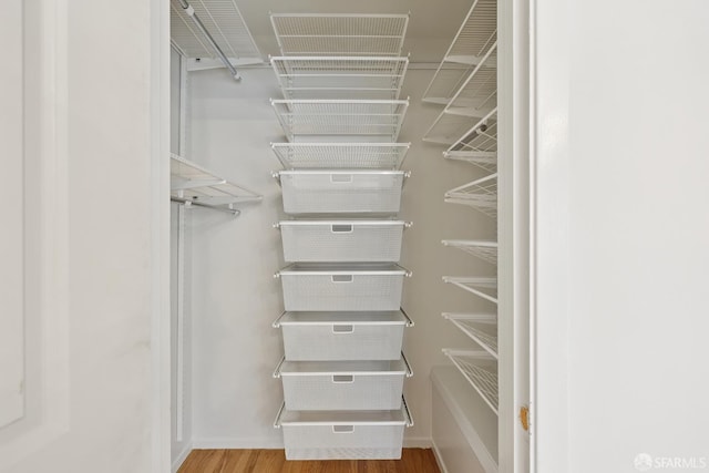 246 Ralston St, San Francisco, CA 94132 - walk in closet with wood finished floors