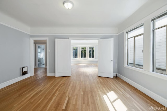 empty room featuring light hardwood / wood-style floors