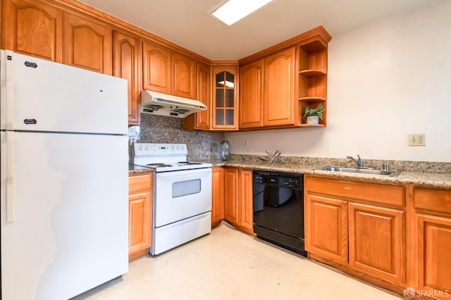 kitchen with backsplash, white appliances, sink, and light stone counters