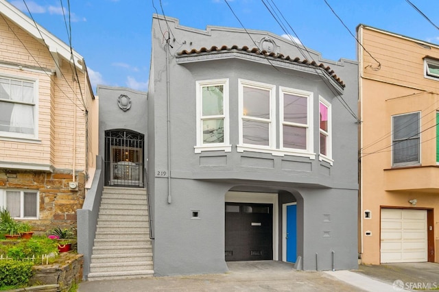 view of front of house featuring stucco siding