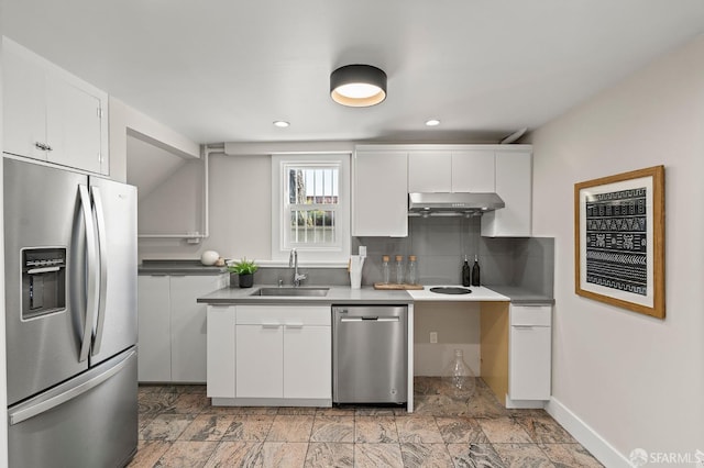 74 Crane St, San Francisco, CA 94124 - kitchen with appliances with stainless steel finishes, a sink, under cabinet range hood, white cabinets, and baseboards