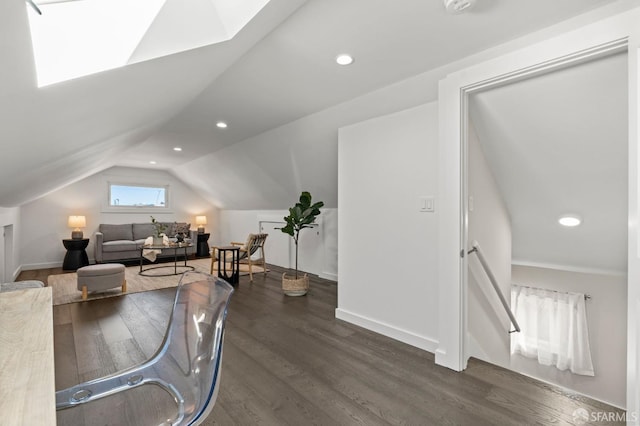 74 Crane St, San Francisco, CA 94124 - dining area with lofted ceiling, wood finished floors, a skylight, baseboards, and recessed lighting
