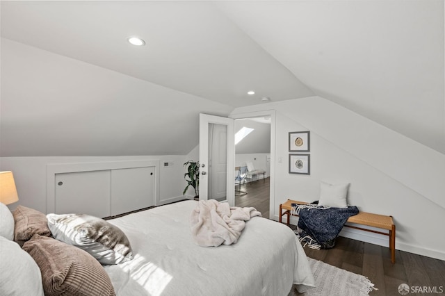 74 Crane St, San Francisco, CA 94124 - bedroom with vaulted ceiling, wood finished floors, and recessed lighting