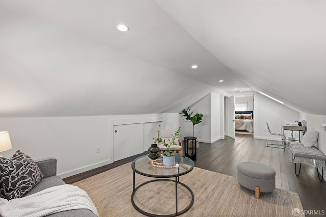 74 Crane St, San Francisco, CA 94124 - living room with wood finished floors, lofted ceiling, baseboards, and recessed lighting