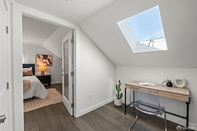 74 Crane St, San Francisco, CA 94124 - bonus room with a skylight, dark wood finished floors, vaulted ceiling, and baseboards
