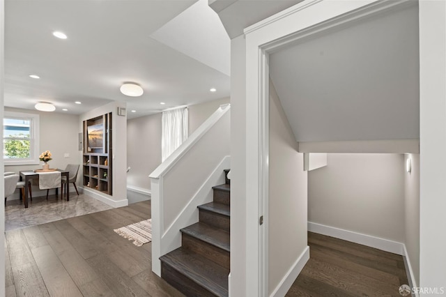 74 Crane St, San Francisco, CA 94124 - stairway featuring wood finished floors, baseboards, and recessed lighting