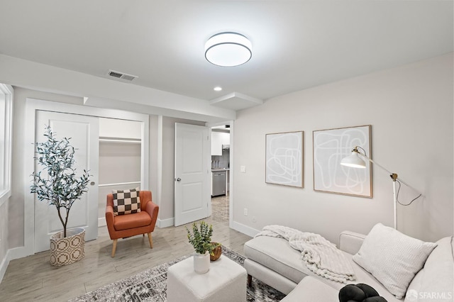 74 Crane St, San Francisco, CA 94124 - living area with light wood-style flooring, baseboards, and recessed lighting