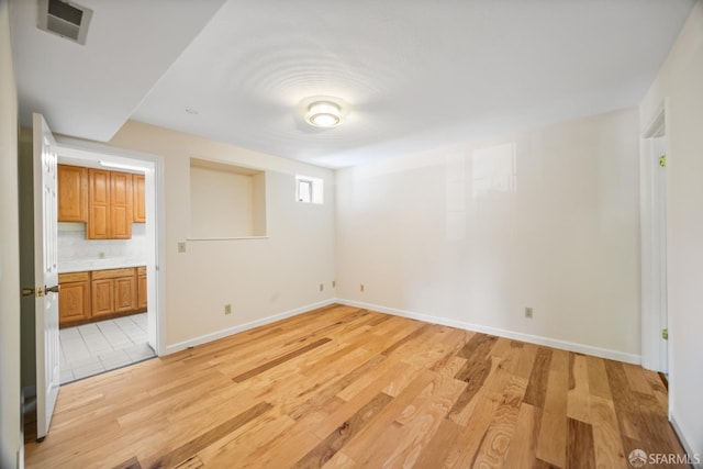 2033 Oakmont Dr, San Bruno, CA 94066 - unfurnished room featuring light wood-style floors and baseboards