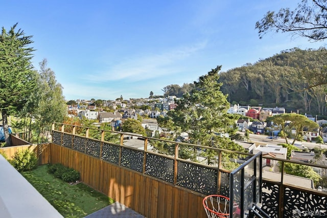 balcony featuring a mountain view