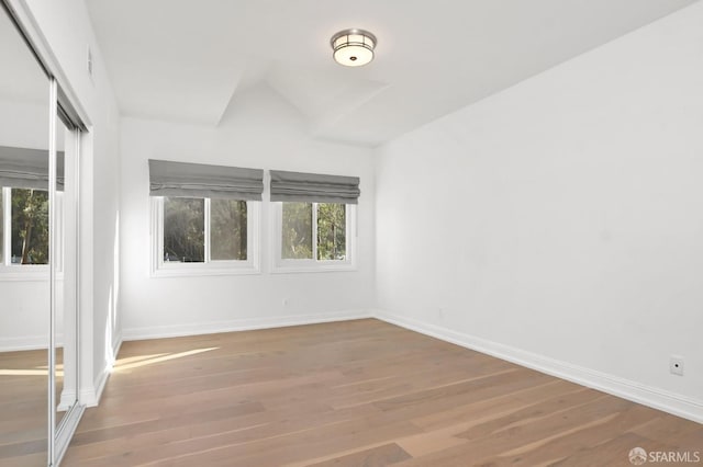 empty room featuring hardwood / wood-style floors