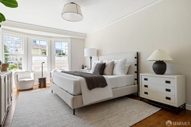 bedroom featuring dark wood-type flooring