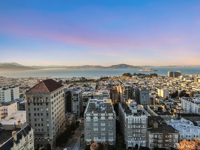 city view with a water and mountain view