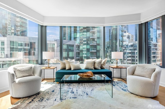 sunroom featuring a view of city