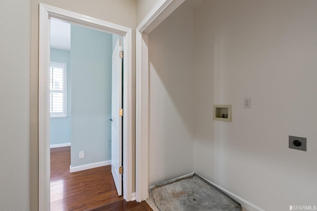 clothes washing area with dark hardwood / wood-style floors, washer hookup, and hookup for an electric dryer