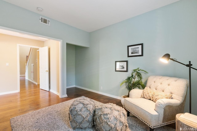 living area featuring hardwood / wood-style floors