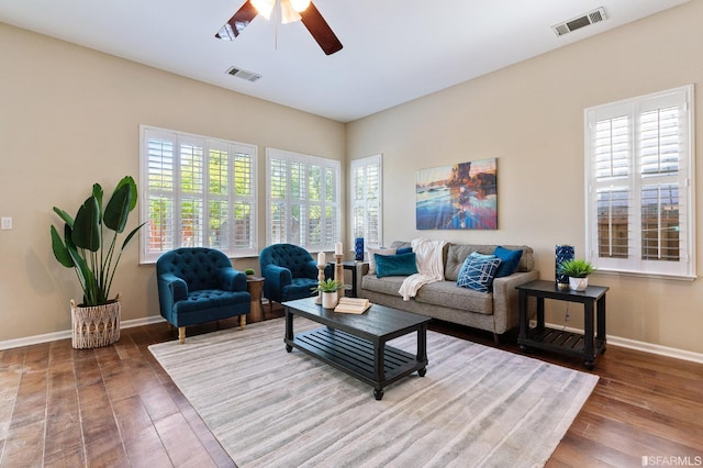 living room featuring ceiling fan, a healthy amount of sunlight, and hardwood / wood-style floors