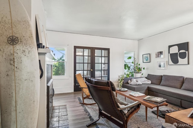 488 41st St, Oakland, CA 94609 - living room featuring french doors, wood finished floors, and crown molding