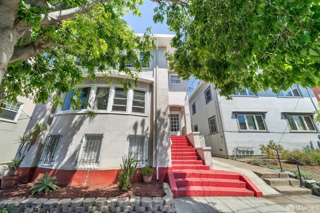 488 41st St, Oakland, CA 94609 - view of front of property featuring stucco siding and stairs