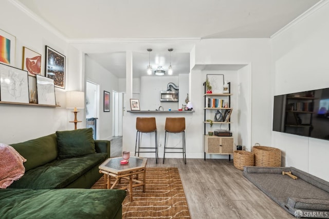 488 41st St, Oakland, CA 94609 - living room with wood finished floors and radiator heating unit