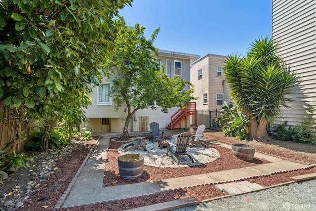 488 41st St, Oakland, CA 94609 - view of patio with stairway and a fire pit