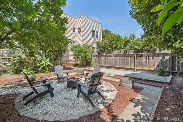 488 41st St, Oakland, CA 94609 - view of patio featuring an outdoor fire pit