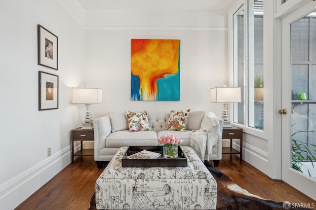 living area with dark wood finished floors and baseboards