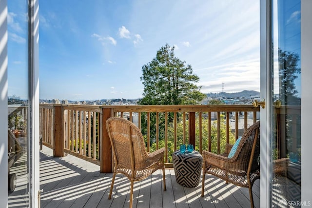 view of wooden balcony with a wooden deck