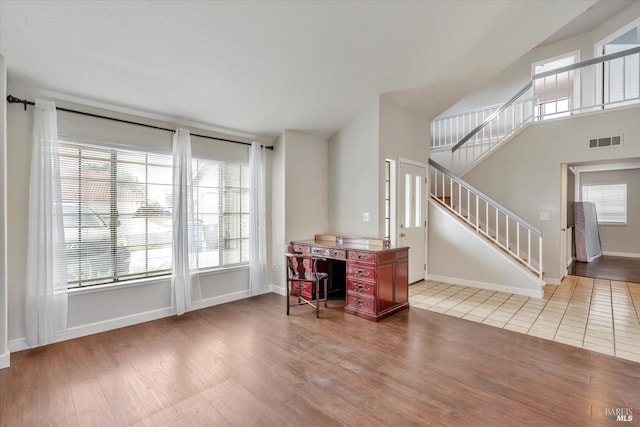 office space with hardwood / wood-style floors