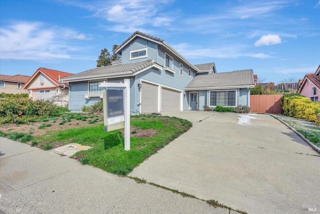 view of front of property with a garage