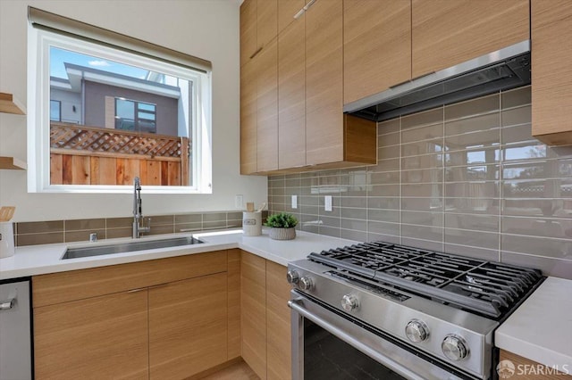 3875 El Camino Real Unit 2, Palo Alto, CA 94306 - kitchen with stainless steel appliances, decorative backsplash, light countertops, and exhaust hood