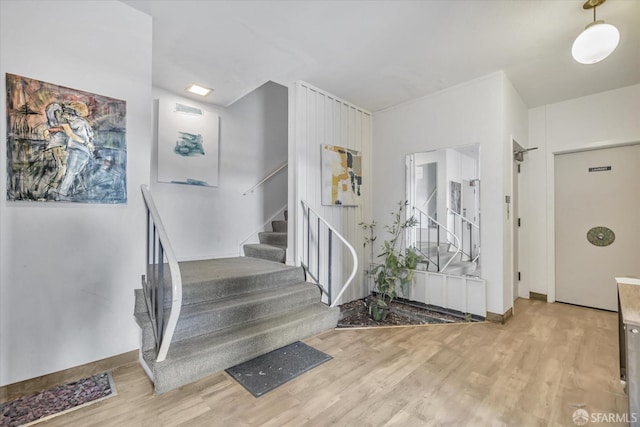 foyer entrance featuring light hardwood / wood-style flooring