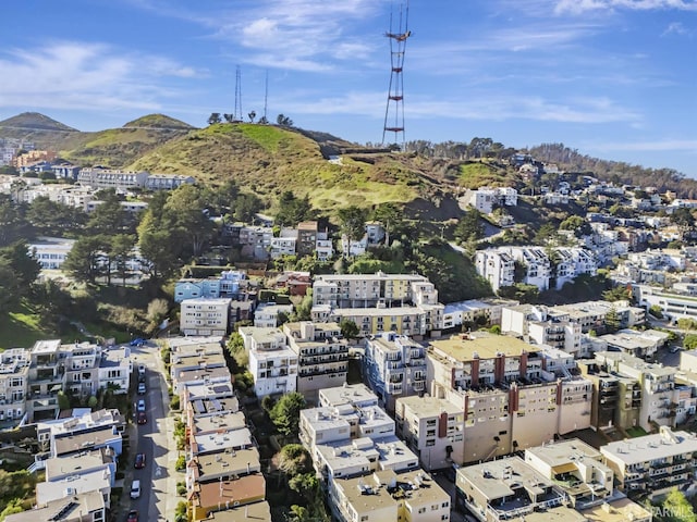 birds eye view of property with a mountain view