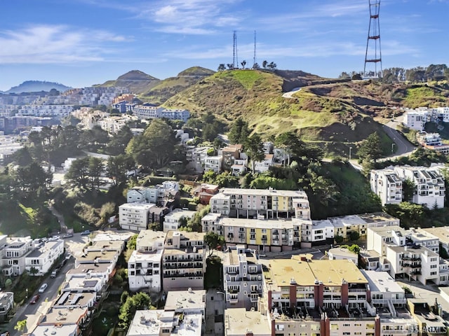 birds eye view of property with a mountain view