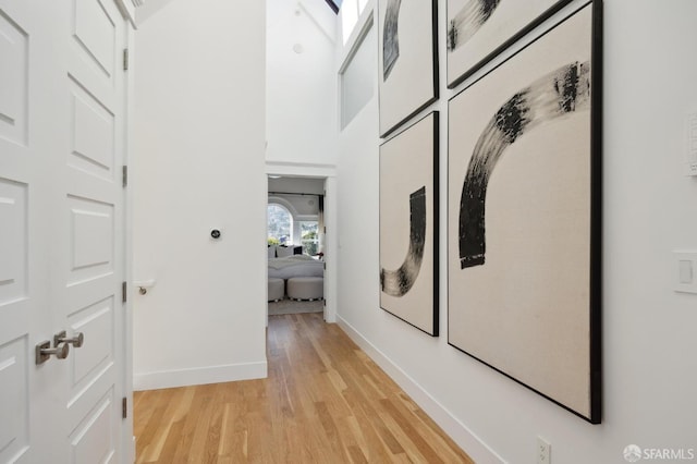 hallway featuring light hardwood / wood-style flooring