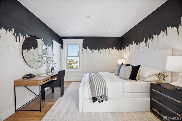 bedroom with light wood-type flooring