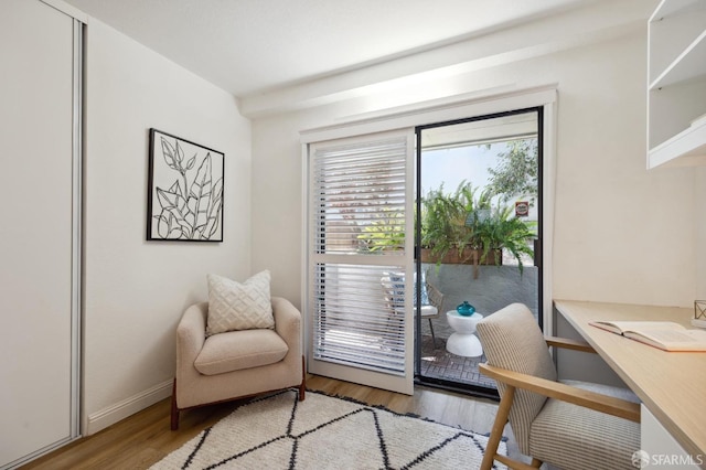 entryway with light hardwood / wood-style floors