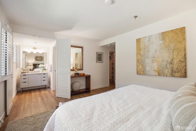 bedroom featuring light wood-type flooring